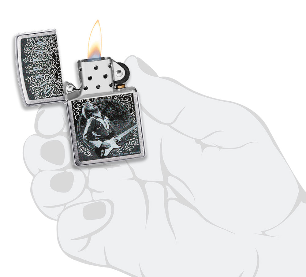 Zippo Lighter Front View Brushed Chrome Opened and Lit with Eric Clapton Image of Ron Pownall in Stylised Hand